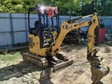 2021 Caterpillar 301.7 mini excavator, front three-quarter view