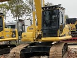 Komatsu PC200-8N1 Raupenbagger, Front-Dreiviertelansicht
