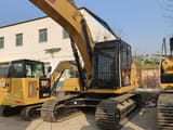 2024 Caterpillar 320GC crawler excavator, front three-quarter view