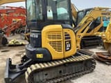 2011 Komatsu PC35MR mini excavator, front three-quarter view