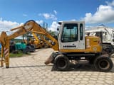 2000 Liebherr A310B wheel excavator side view