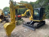2024 Komatsu PC70-8 mini excavator, front three-quarter view