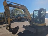 2016 Komatsu PC55MR-3 mini excavator, side view