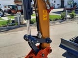 Kubota XE27E mini excavator boom and quick coupler detail