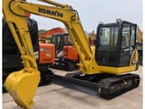 2024 Komatsu PC56 mini excavator, front three-quarter view