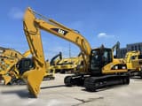 Escavatore cingolato Caterpillar 320CL del 2020, vista laterale