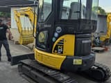 2023 Komatsu PC35 MR mini excavator, three-quarter view