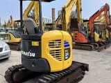 2022 Komatsu PC20MR-3 mini excavator, rear three-quarter view