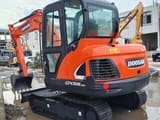2014 Doosan DX55-9C crawler excavator, rear three-quarter view