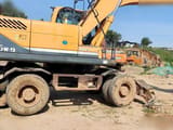 2010 Hyundai R210W-9 wheel excavator side view