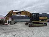 Escavatore cingolato Caterpillar 320DL del 2011, vista laterale