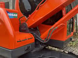 2020 Doosan DX75-9C crawler excavator, side view of cab and boom
