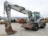 2009 Caterpillar M313D wheel excavator side view