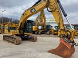 2018 Caterpillar 323-07 crawler excavator, front three-quarter view