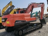 2024 Doosan DX225LCA crawler excavator, rear three-quarter view