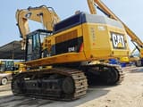 2019 Caterpillar 374DL crawler excavator, rear three-quarter view