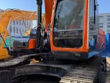 Doosan DX340LC-9C crawler excavator, front three-quarter view
