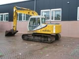 2012 Kato HD512-3 crawler excavator, side view