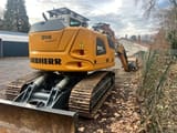 2021 Liebherr 914 Compact S crawler excavator, rear three-quarter view