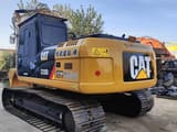 2016 Caterpillar 320DL crawler excavator, rear three-quarter view