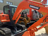 2022 Doosan DX55 crawler excavator, side view