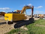 2004 Hyundai R210LC-7 crawler excavator, rear three-quarter view