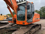 2009 Doosan DX255LC crawler excavator, front three-quarter view
