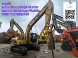 2021 Caterpillar 324DL crawler excavator with hydraulic breaker attachment