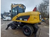 2007 Caterpillar M316D wheel excavator, rear three-quarter view