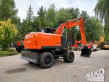2016 Hitachi Zaxis 140W wheel excavator, rear three-quarter view