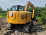 2020 Caterpillar 307E mini excavator, rear three-quarter view