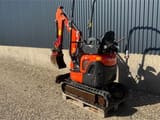 2019 Kubota U10-3 mini excavator, rear three-quarter view