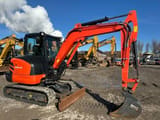 2023 Kubota KX042-4A mini excavator, side view