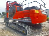 2023 Doosan DX300LC-9C excavator, rear three-quarter view