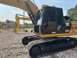 Escavadora de rastos Caterpillar 320DL de 2022, vista lateral