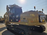 2022 Caterpillar 323DL crawler excavator, rear three-quarter view