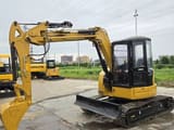 2022 Caterpillar 305C mini excavator, side profile view