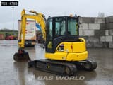 2024 Komatsu PC55MR-5 mini excavator, rear three-quarter view