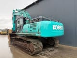 2014 Kobelco SK500LC-9 crawler excavator, rear three-quarter view