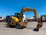 2011 Komatsu PW118 MR-8 wheel excavator, side profile view
