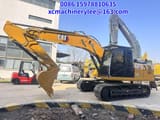 2024 Caterpillar 320GC crawler excavator, side profile view