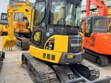 2018 Komatsu PC-55MR mini excavator, front three-quarter view