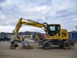 2018 Komatsu PW148-10 wheel excavator, side profile view