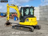 2024 Komatsu PC55MR-5 mini excavator, rear three-quarter view