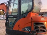 2024 Doosan DX60 mini excavator, side profile view