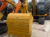 2024 Caterpillar 323 crawler excavator front view with bucket