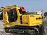 2022 Komatsu PC120 crawler excavator, rear three-quarter view