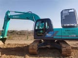 Kobelco SK210 crawler excavator, side profile view
