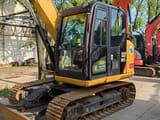 2022 Caterpillar 307E2 excavator, front three-quarter view