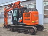 2022 Hitachi ZX135US-7 crawler excavator, rear three-quarter view